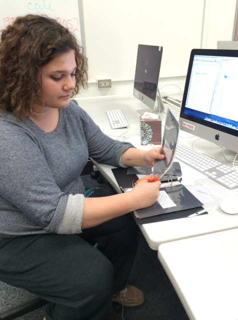 Feigler rehearsing her poem piece for a performance.