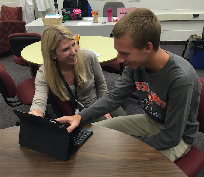 “Everyday Hero” Heidi Haen works with senior Tripp Wallner.