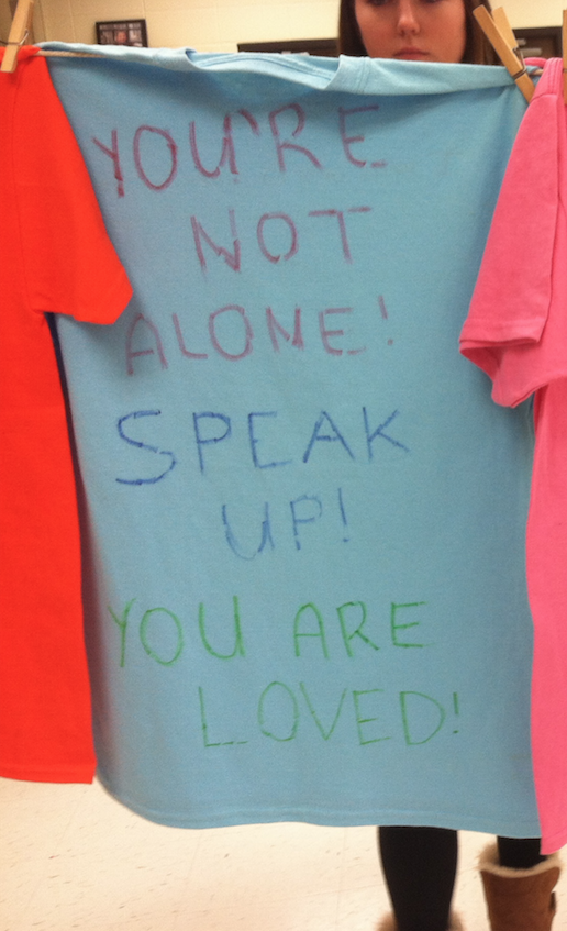 T–shirts displayed with the stories of survivors who went through sexual assault.