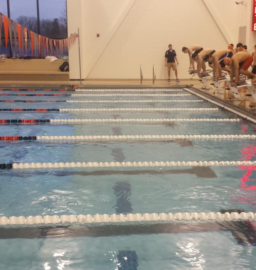 The swimming team gets ready for a recent meet against Wheeling at the new natatorium. 