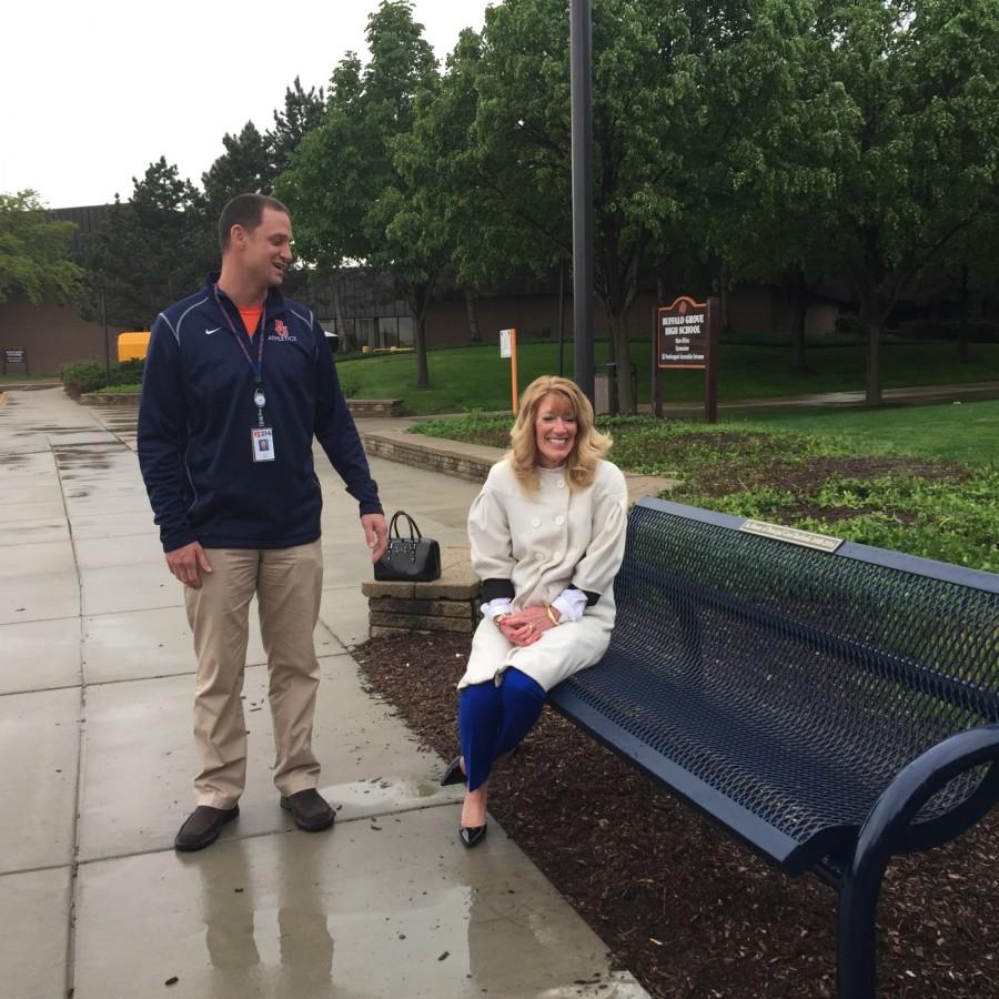 Former BG principal Carol Burlinski sits on honorary bench alongside principal Jeff Wardle.