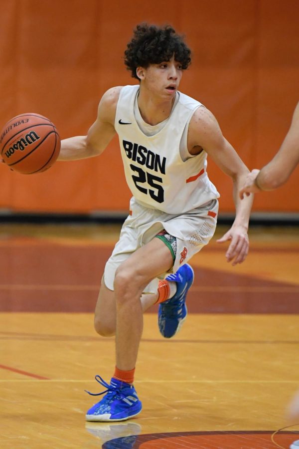 On the Court: Senior Adidas Davis takes the ball down the court during the Senior Night Game vs. Prospect on Feb. 11.