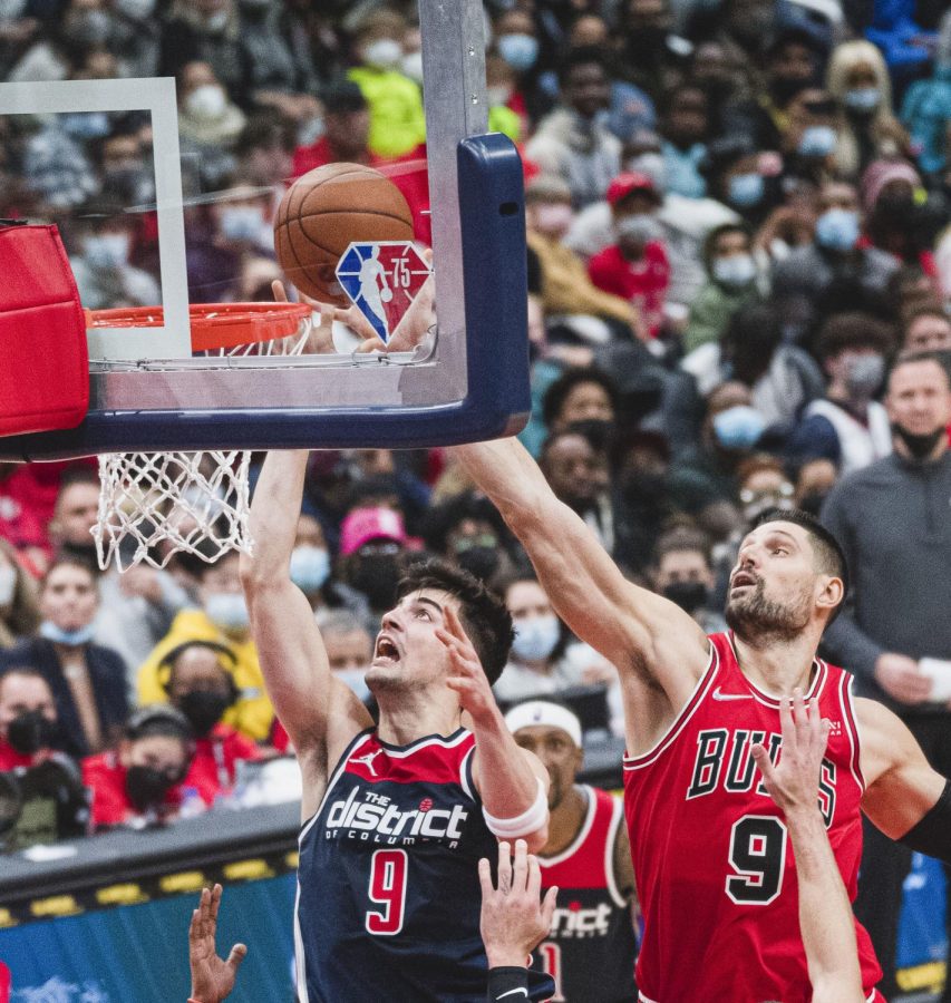 FIGHT ON: Deni Avdija and Nikola Vucevic battling at the rim, Washington Wizards vs Chicago Bulls on January 1, 2022 